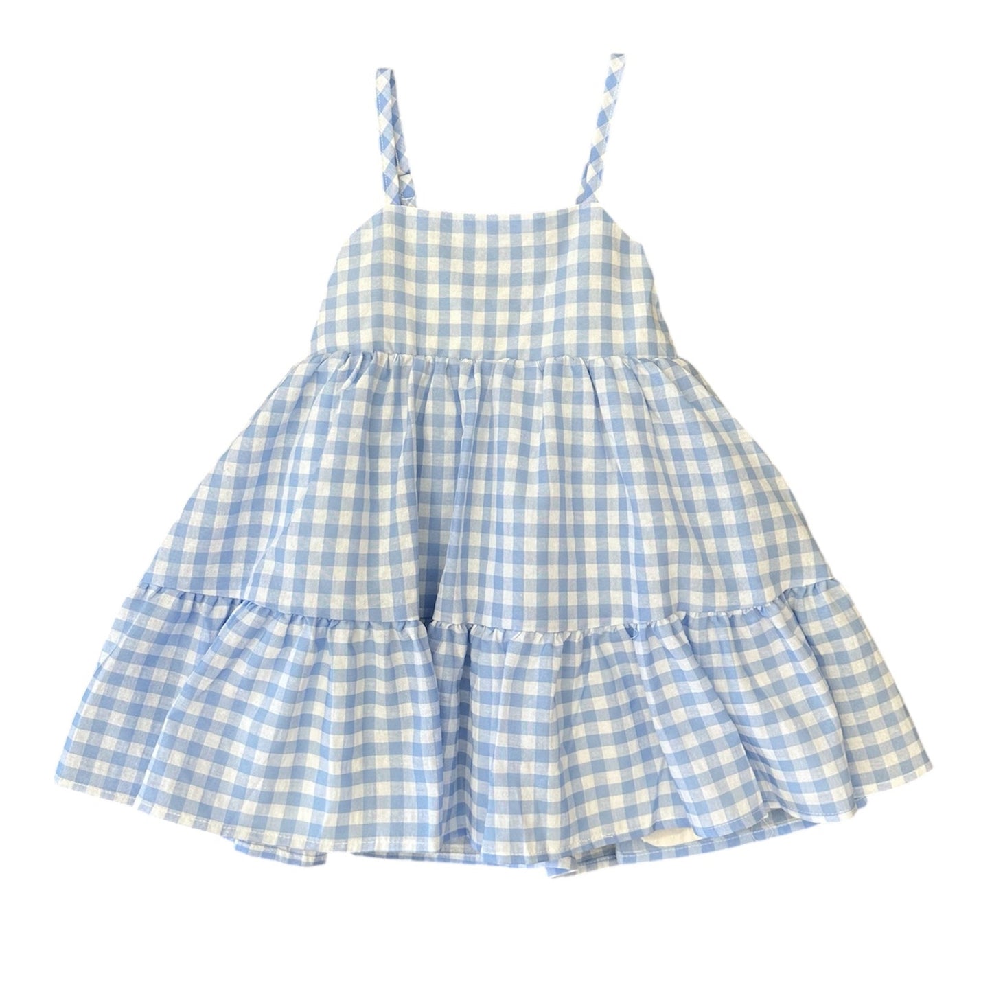 Toddler wearing a blue gingham spaghetti strap dress, lightweight and comfortable for warm weather.