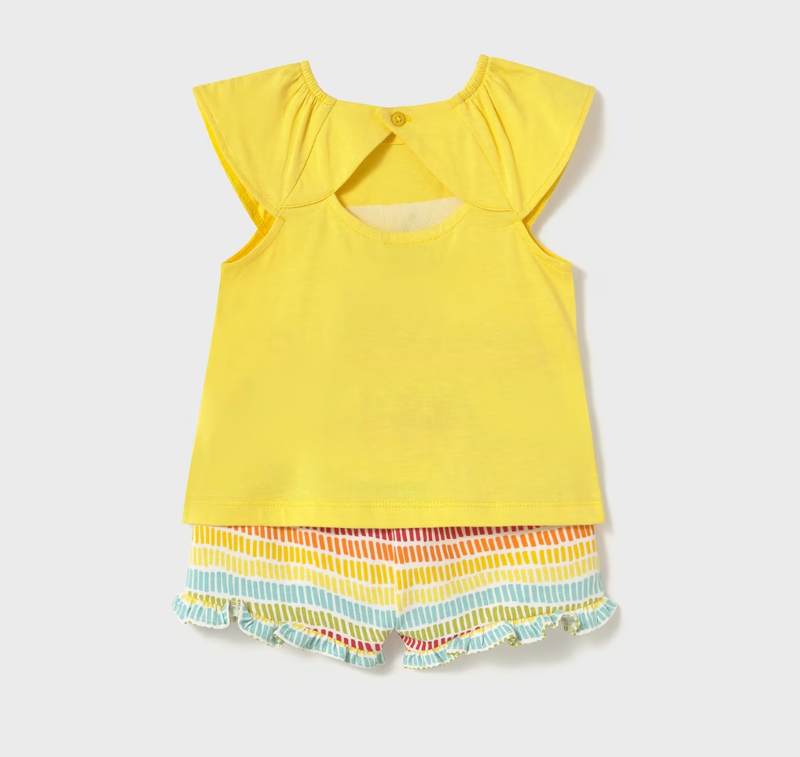 Mayoral baby girl two-piece summer set with yellow citrus-themed top featuring 3D leaf accents and rainbow-striped ruffle shorts.