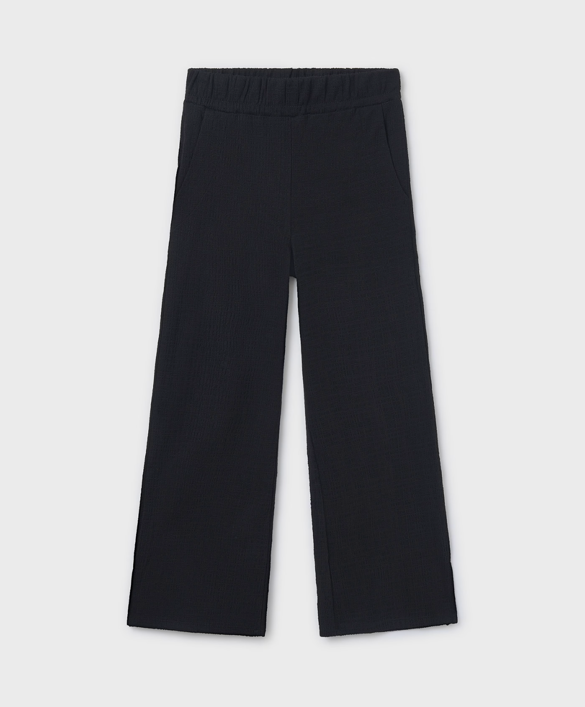 Mayoral Tween black wide leg pants for girls, made from a textured cotton-blend fabric with added stretch, featuring a relaxed silhouette, displayed flat on a white background.