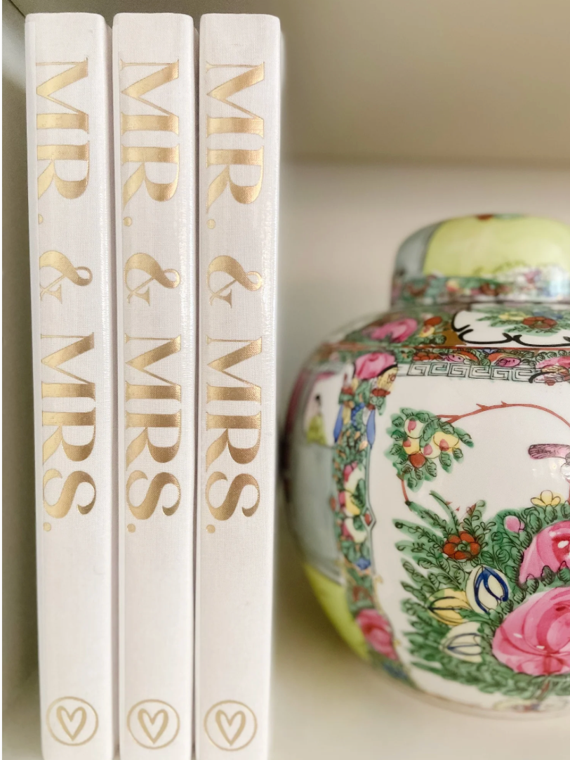 Decorative coffee table book The Blank Book with luxurious cover and gold detail, perfect for nursery decor or as a gift.
