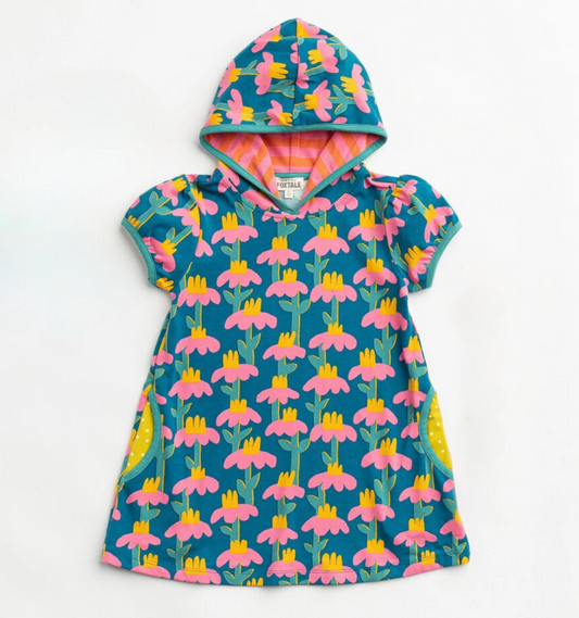 Finding Foxtale Chasing Daisies tunic with hood and pockets, paired with striped leggings featuring button accents at the ankles.