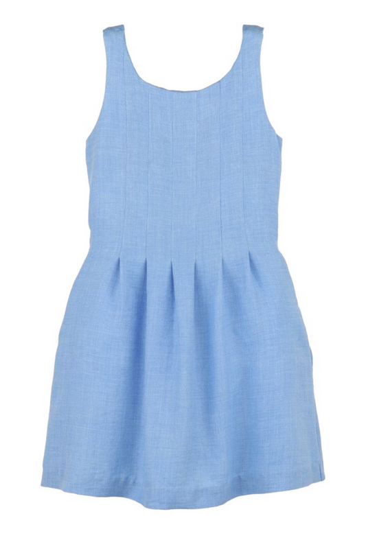 Little girl’s Gabby Willow Blue Pleated Dress with smocked back and side pockets, perfect for twirling and summer fun.