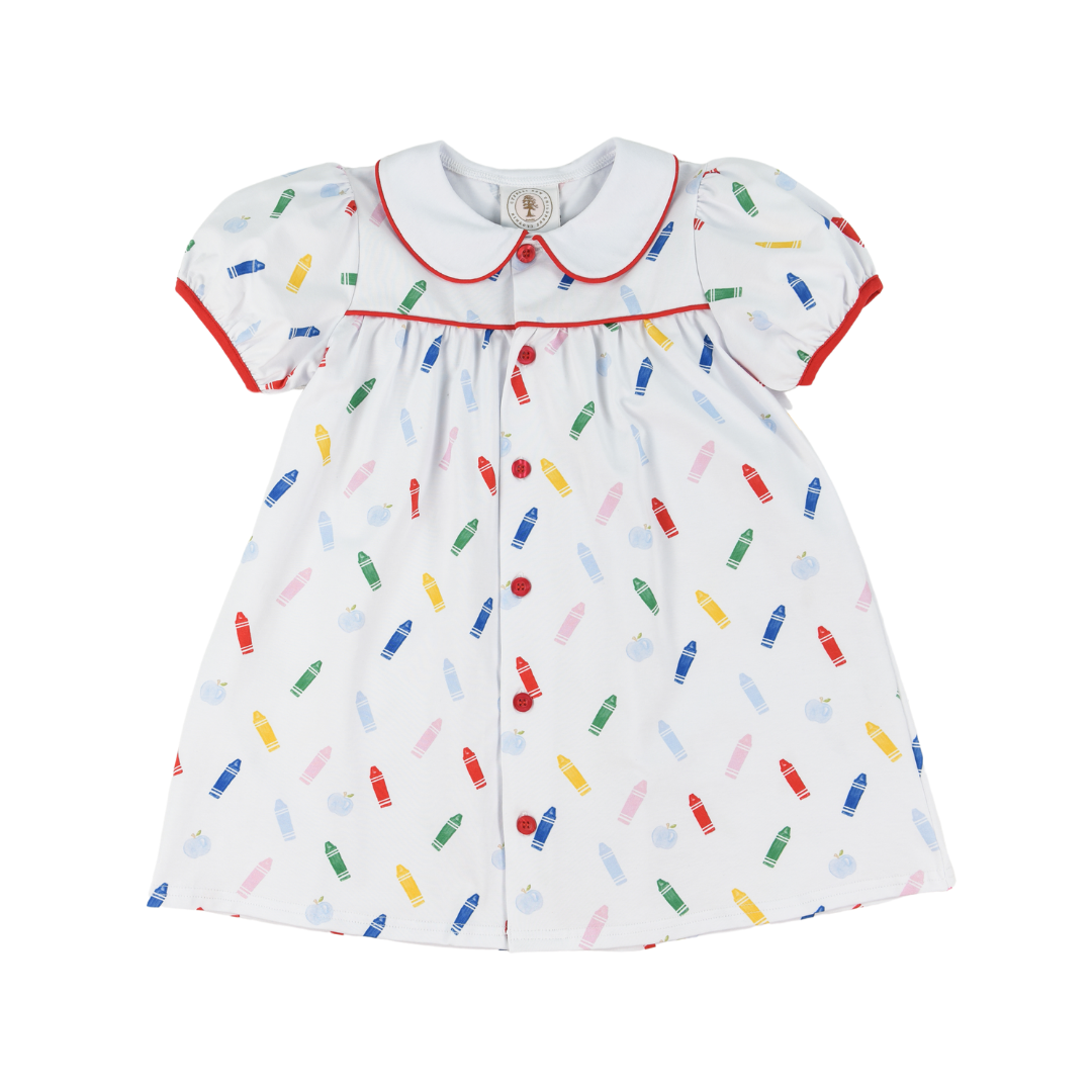 Girls back to school dress with colorful crayon and apple print, button-down front, and collared neckline, made from soft cotton spandex blend.