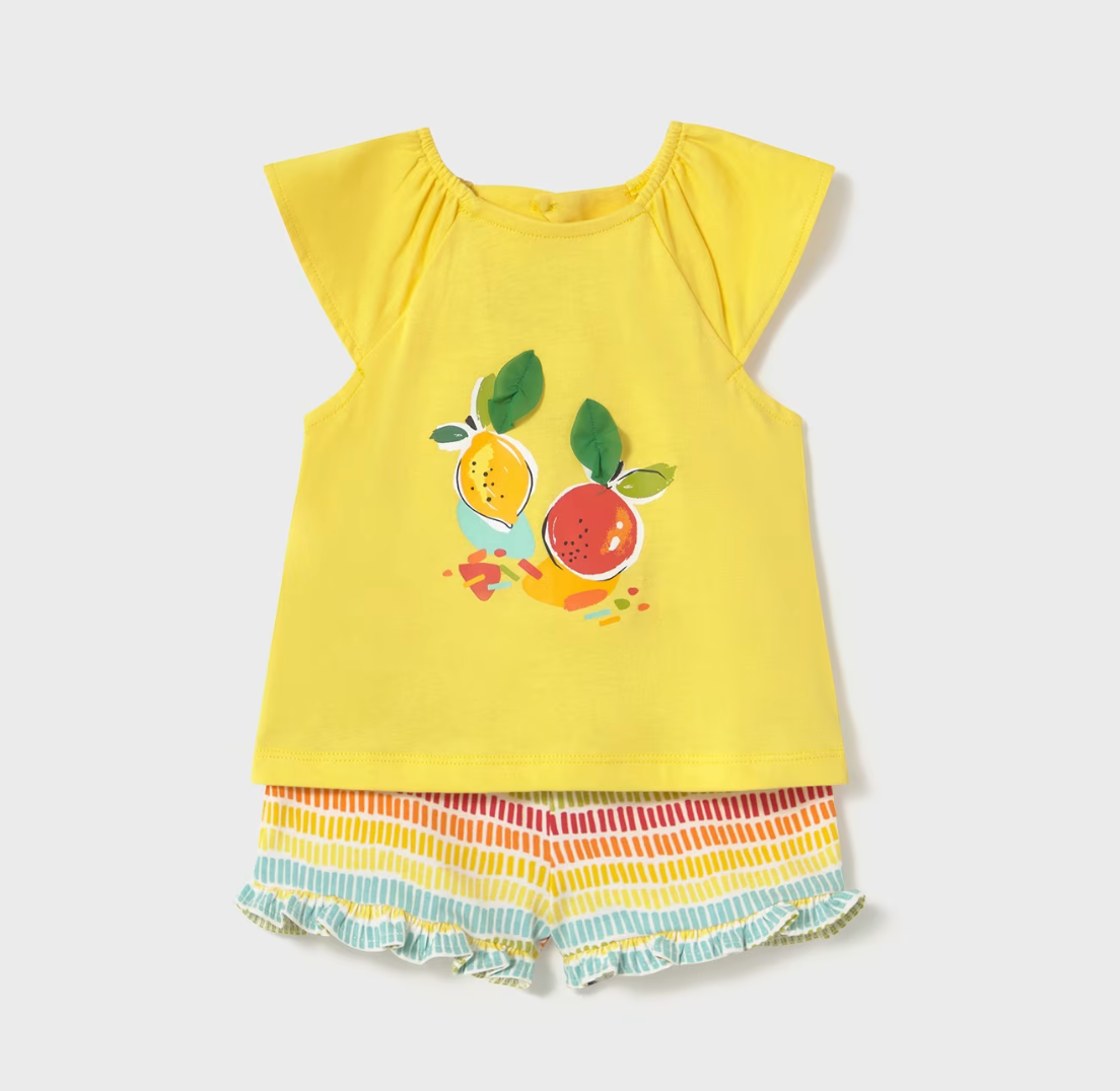 Mayoral baby girl two-piece summer set with yellow citrus-themed top featuring 3D leaf accents and rainbow-striped ruffle shorts.
