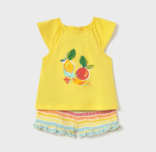 Mayoral baby girl two-piece summer set with yellow citrus-themed top featuring 3D leaf accents and rainbow-striped ruffle shorts.