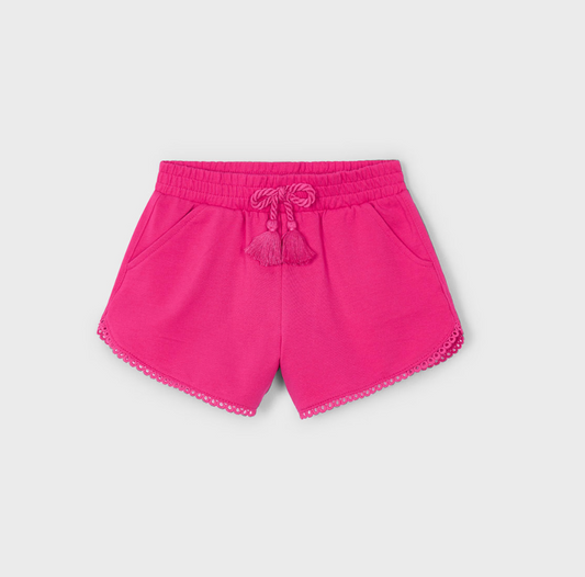 Mayoral girl fuchsia chenille shorts with elastic waist and decorative tie.